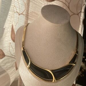 SOLD. Signed Trifari Black Enamel Gold Omega 17”